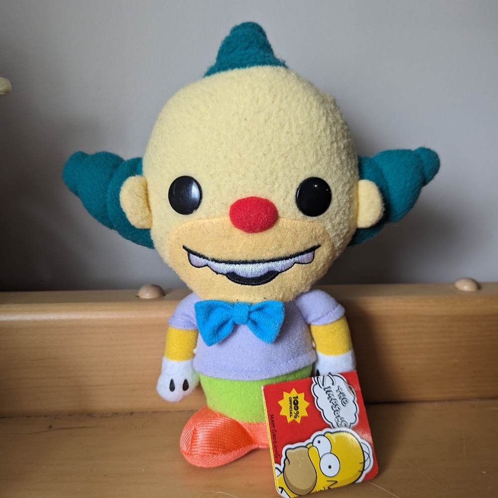 Funko Stuffed Animal with Red, Blue, Yellow, and Purple Colors - Picture 2 of 8